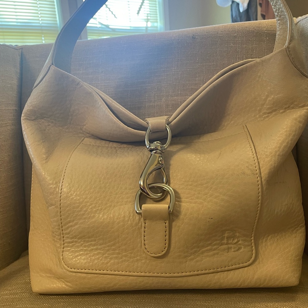 🍒Dooney &Bourke cream handbag🍒in great condition.vintage